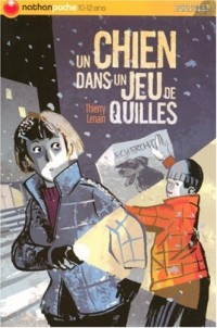 UN CHIEN DANS UN JEU DE QUILLE