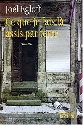 Ce que je fais là, assis par terre