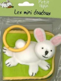 Petit lapin adore jouer ... : Livre-tissu